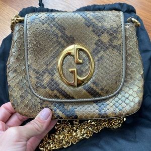Gucci gold python vintage style clutch on chain